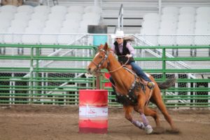 Afton's Kennedy Pebbles competing in the barrel racing in the Idaho District 8 high school rodeo.