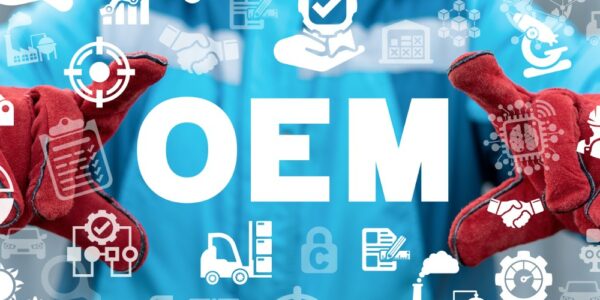 A man in a blue jumpsuit and red gloves framing the acronym "OEM" with his hands. Industrial icons cover the image.