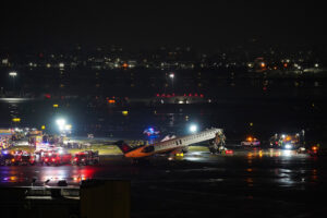 Pilot and copilot killed in collision between jet and fire truck at New York's LaGuardia Airport