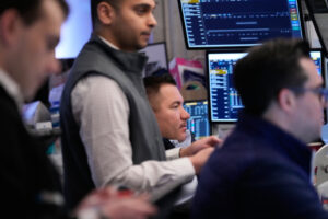 Oil prices rise, but US stocks remain near their record on a muted Wall Street