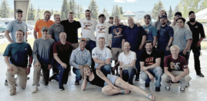 Wrestling generations past honor Clark at community gathering